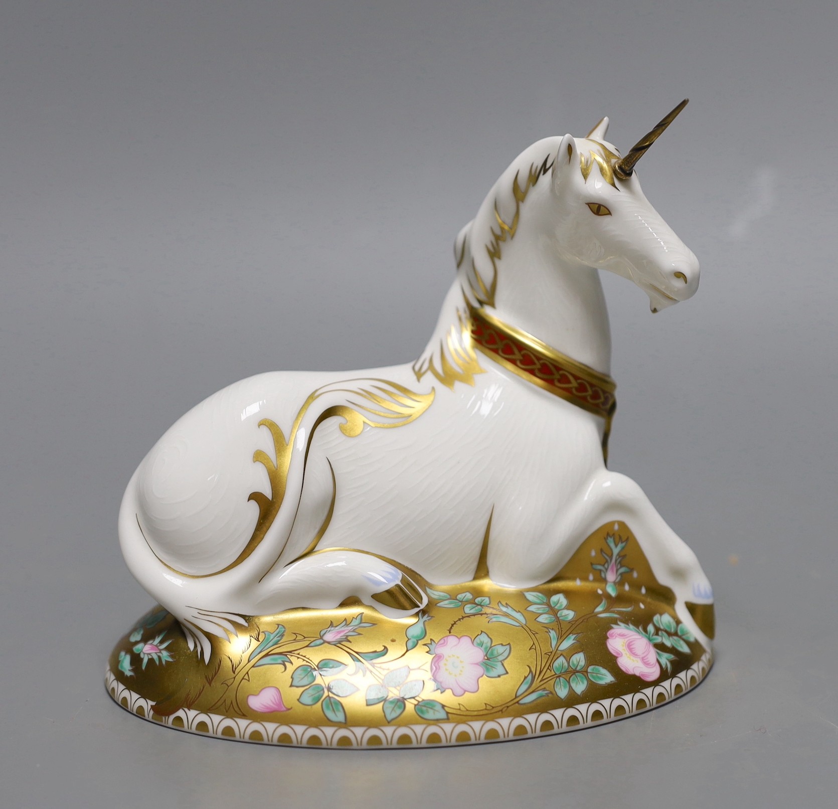 A limited edition Royal Crown Derby paperweight - Mythical Unicorn, gold stopper, boxed, no certificate, 735/1750